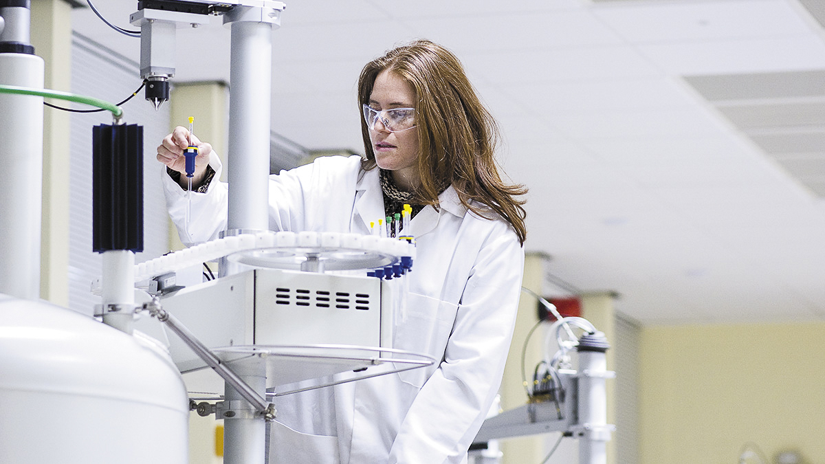Student using machinery in the Chemical Analysis Facility