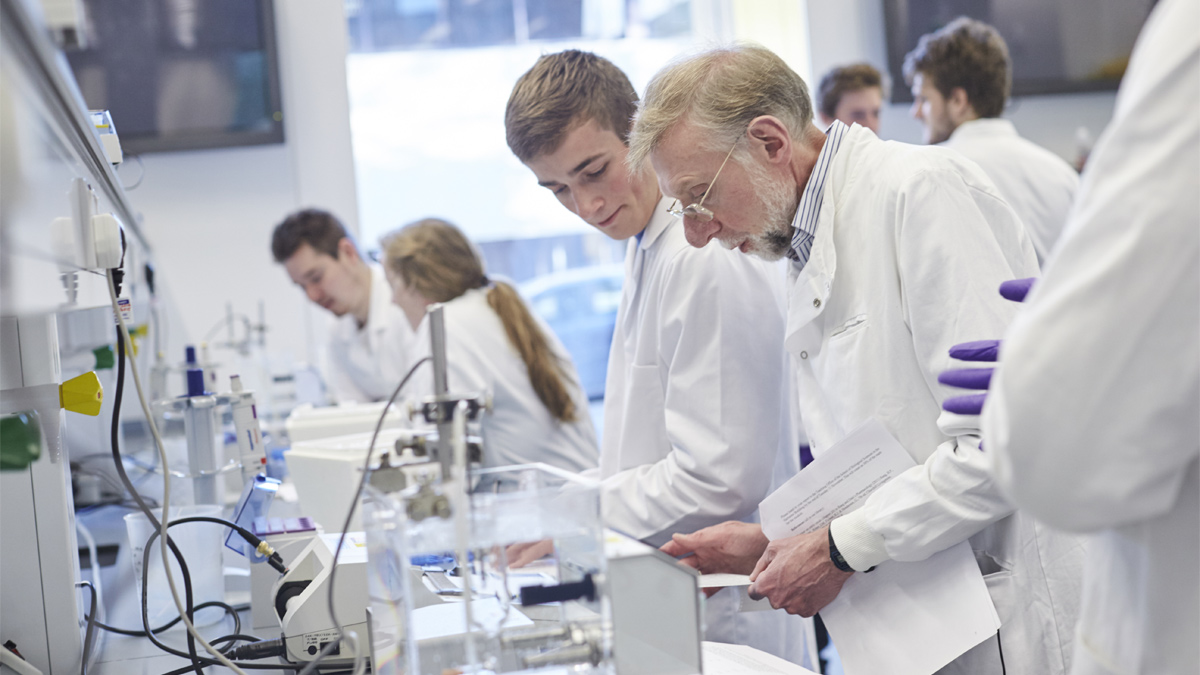 Student and professor working on a lab experiment