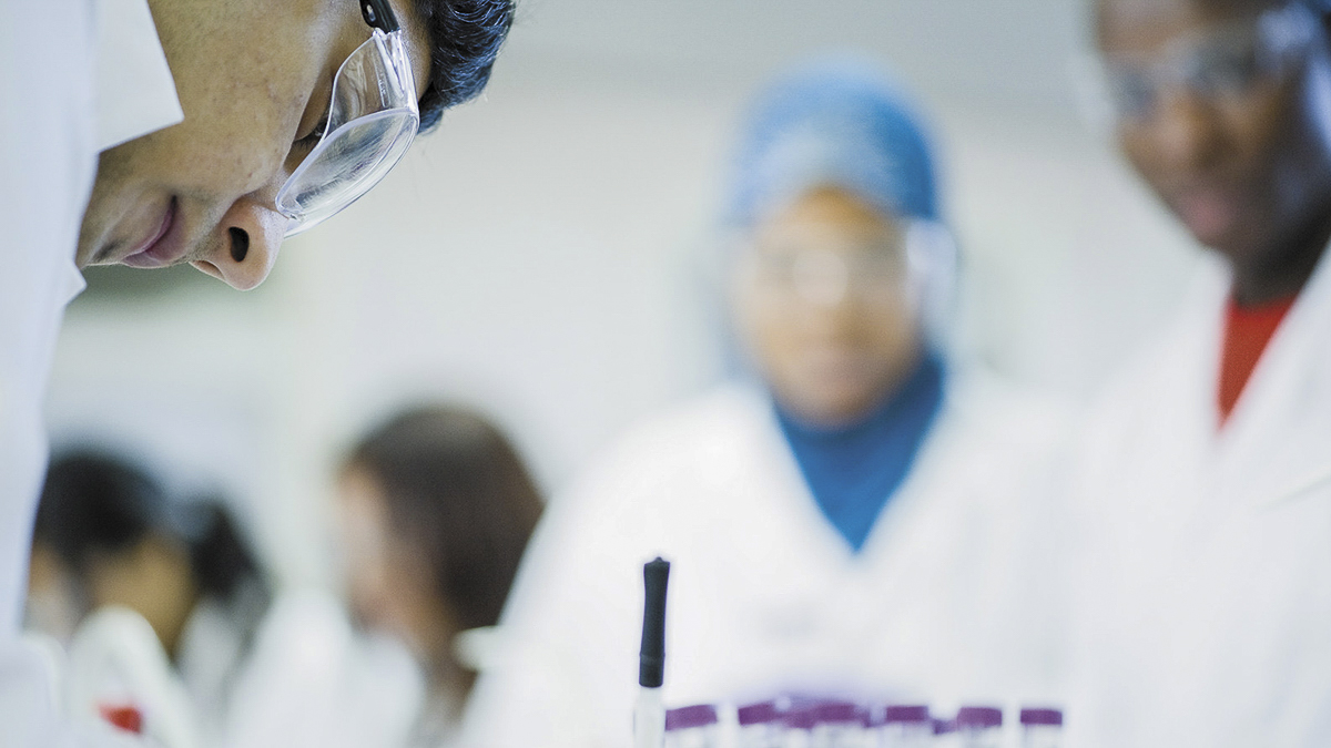 A student recording the results of an experiment