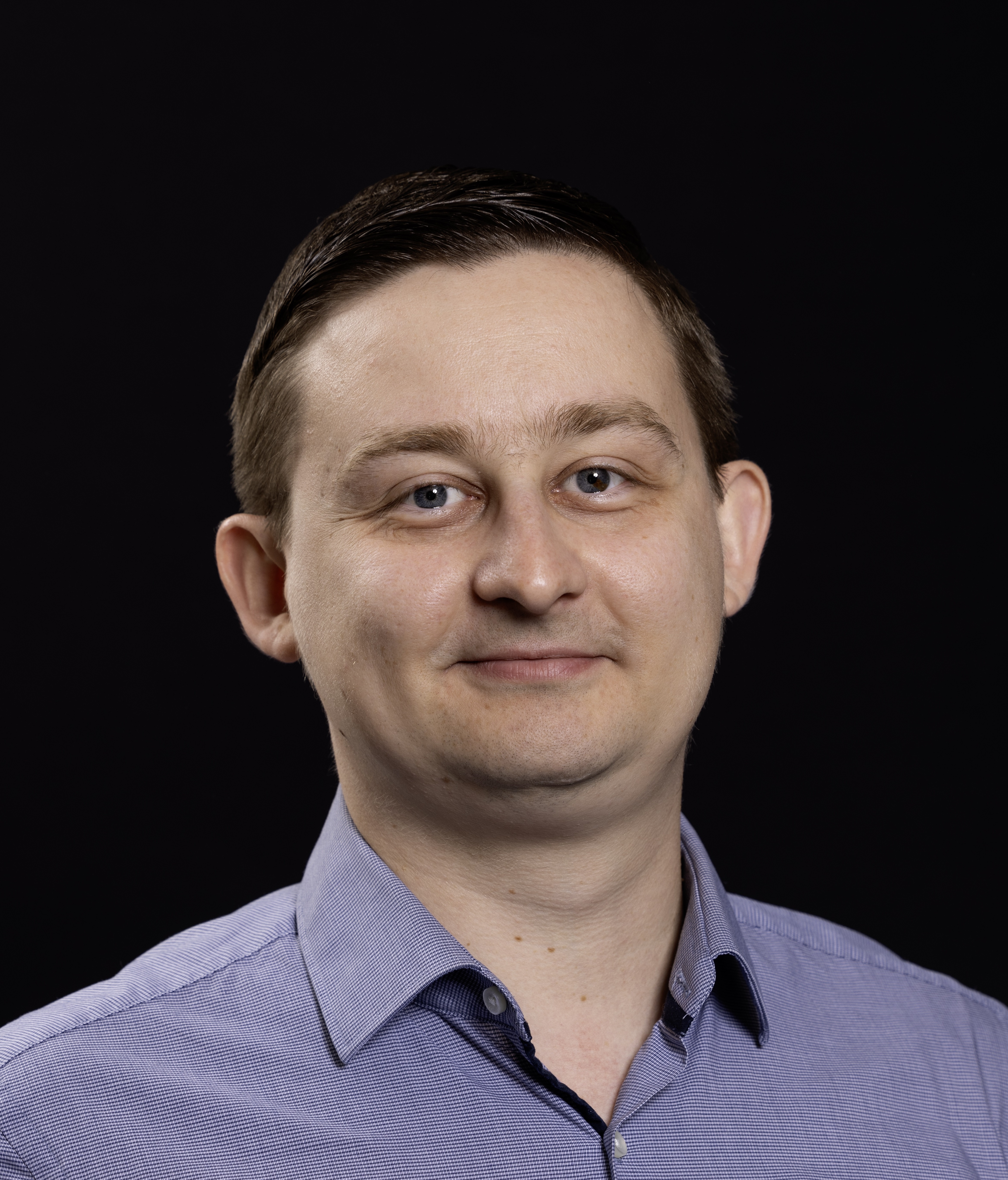Headshot of Dr Roman Moiseev